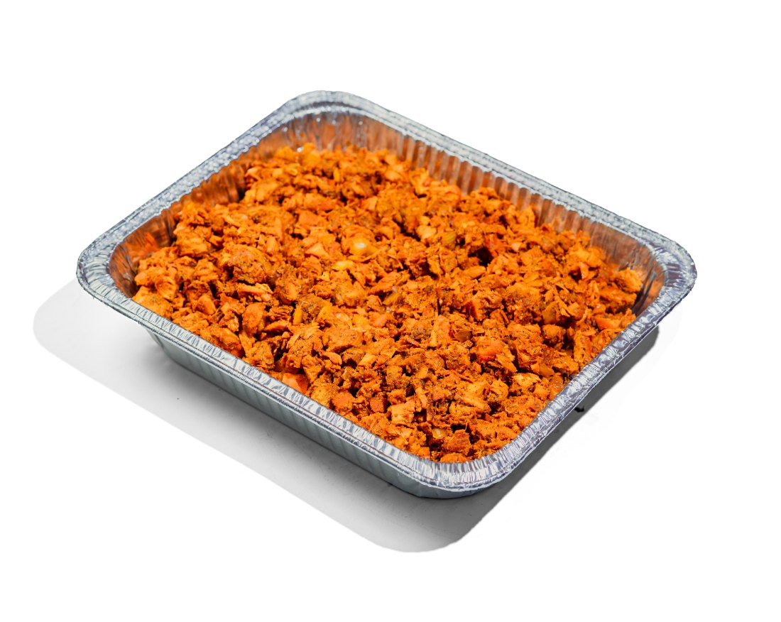 Catering tray of chopped chicken